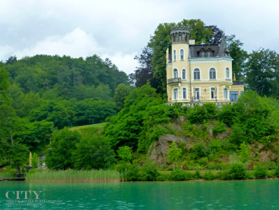 A beautiful house graces lake Woerthersee near Klagenfurt Austria