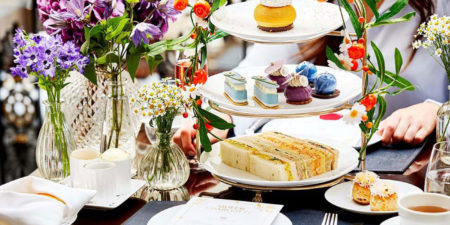 City Style and Living Summer 2023 Lanesborough Bridgerton Tea Experience tiered tray with sandwiches and desserts
