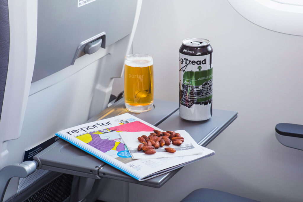 City Style and Living Fall 2024 I Flew on Porter Airlines Review snacks and beer on tray table