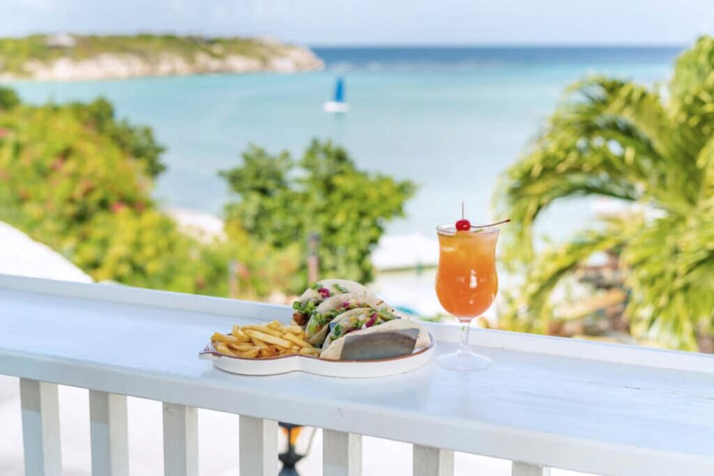 City Style and Living Magazine Spring 2025 The Verandah Antigua food overlooking beach