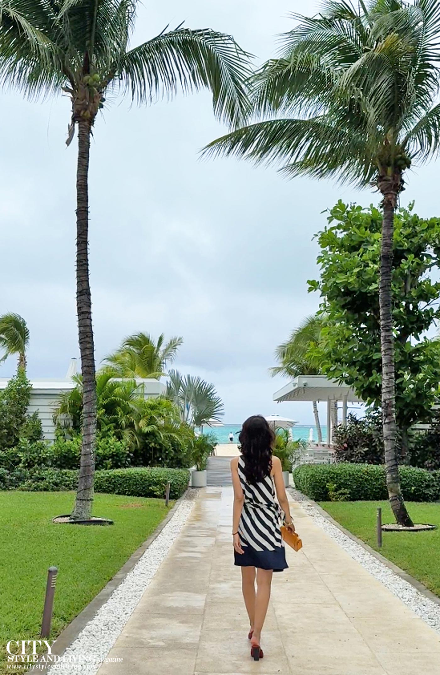 City Style and Living Magazine Spring 2025 Turks and Caicos Girl Walking on Path