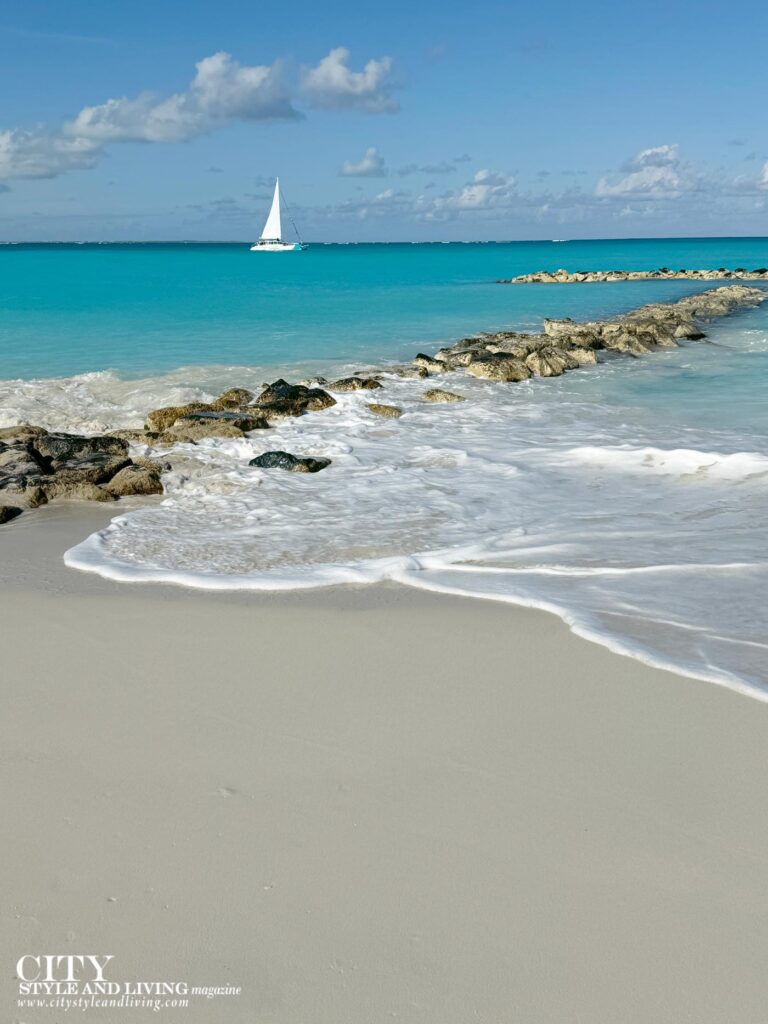 City Style and Living Magazine Spring 2025 Turks and Caicos Sailboat on Beach