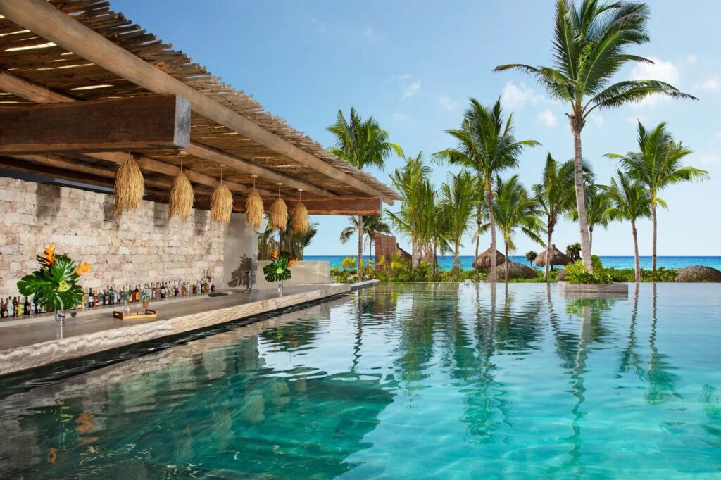 City Style and Living Magazine Summer 2025 Why We're Obsessed with These Hot Hotel Bars Sugar-Reef-Swim-Up-BarSecrets