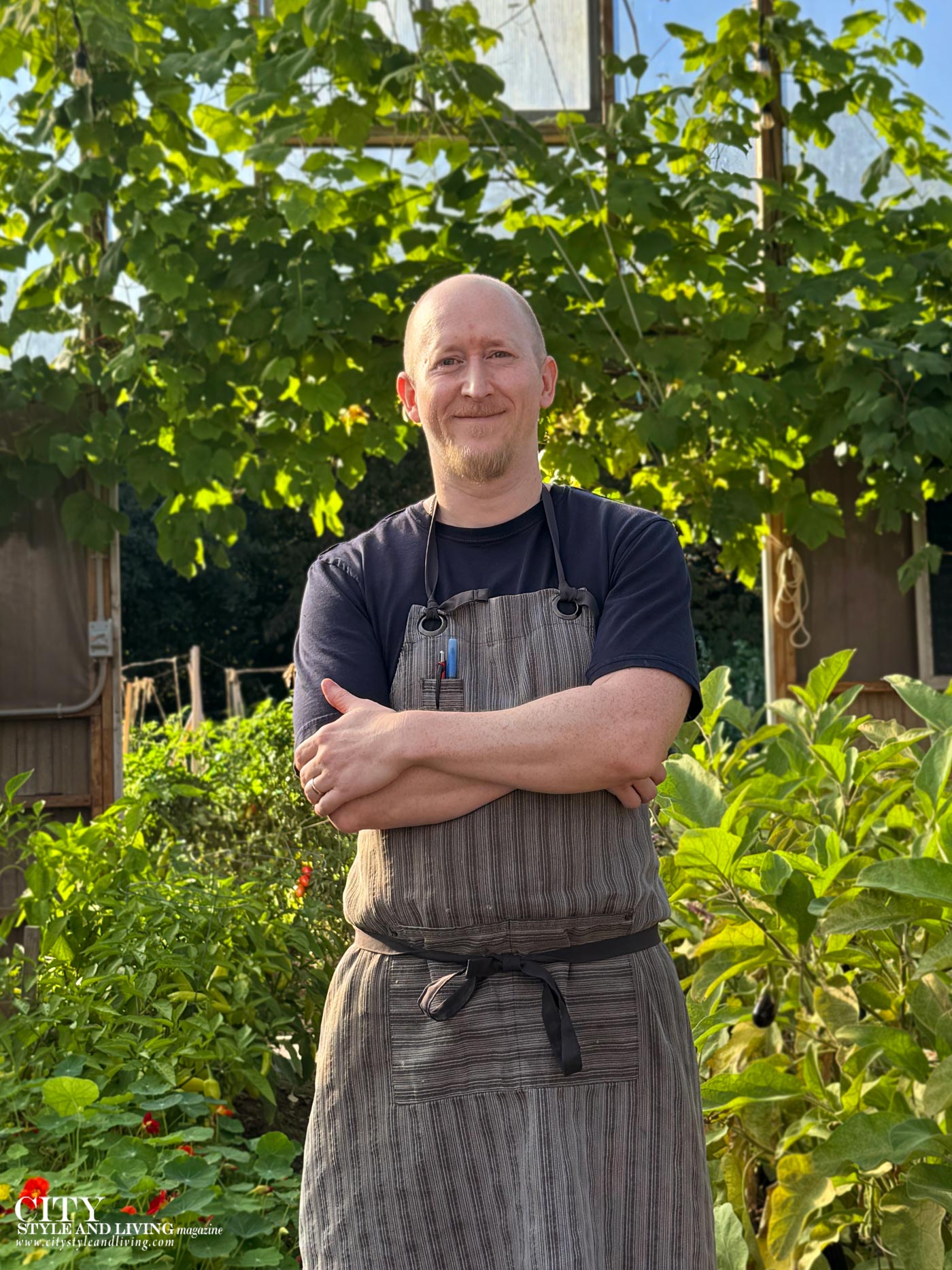 City Style and Living Magazine Winter 2025 Mysa Nordic Spa & Resort Chef Seth Shaw in greenhouse