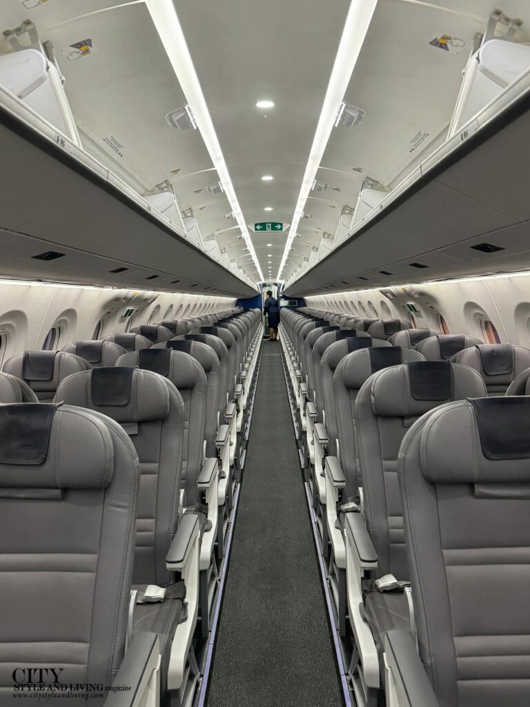 City Style and Living Magazine Winter 2025 Porter Airlines to the Canadian Maritimes rows of seats on airplane