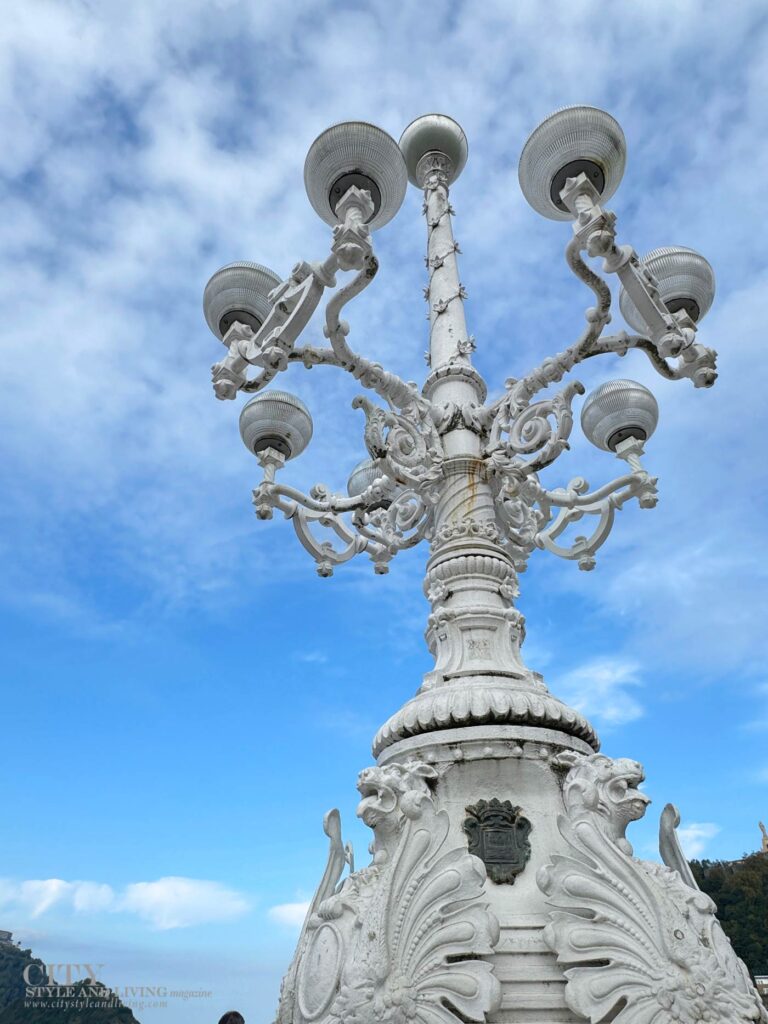 City Style and Living Magazine Spring 2026 San Sebastian Pasaia Basque Country San Sebastian white candelabra boardwalk streetlamp